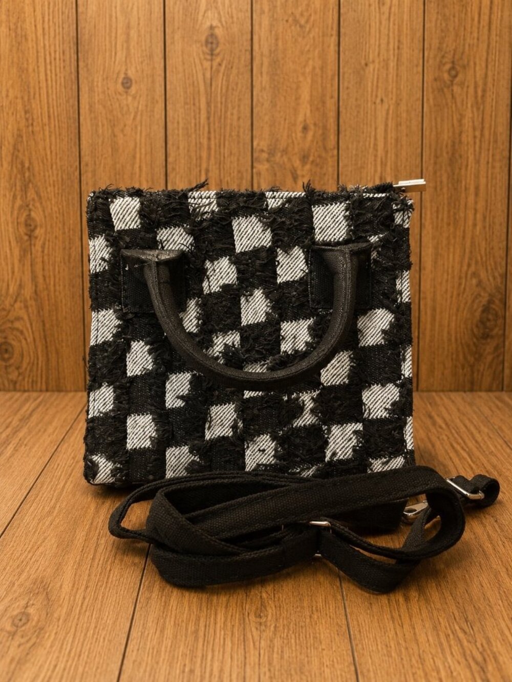 Denim black and white checkered mini handbag featuring a textured finish